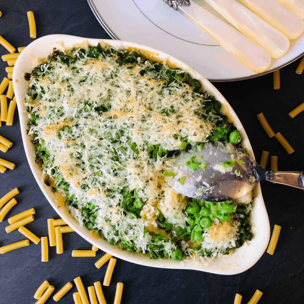 Overhead photograph of a dish vegan mac and cheese with a pea crust