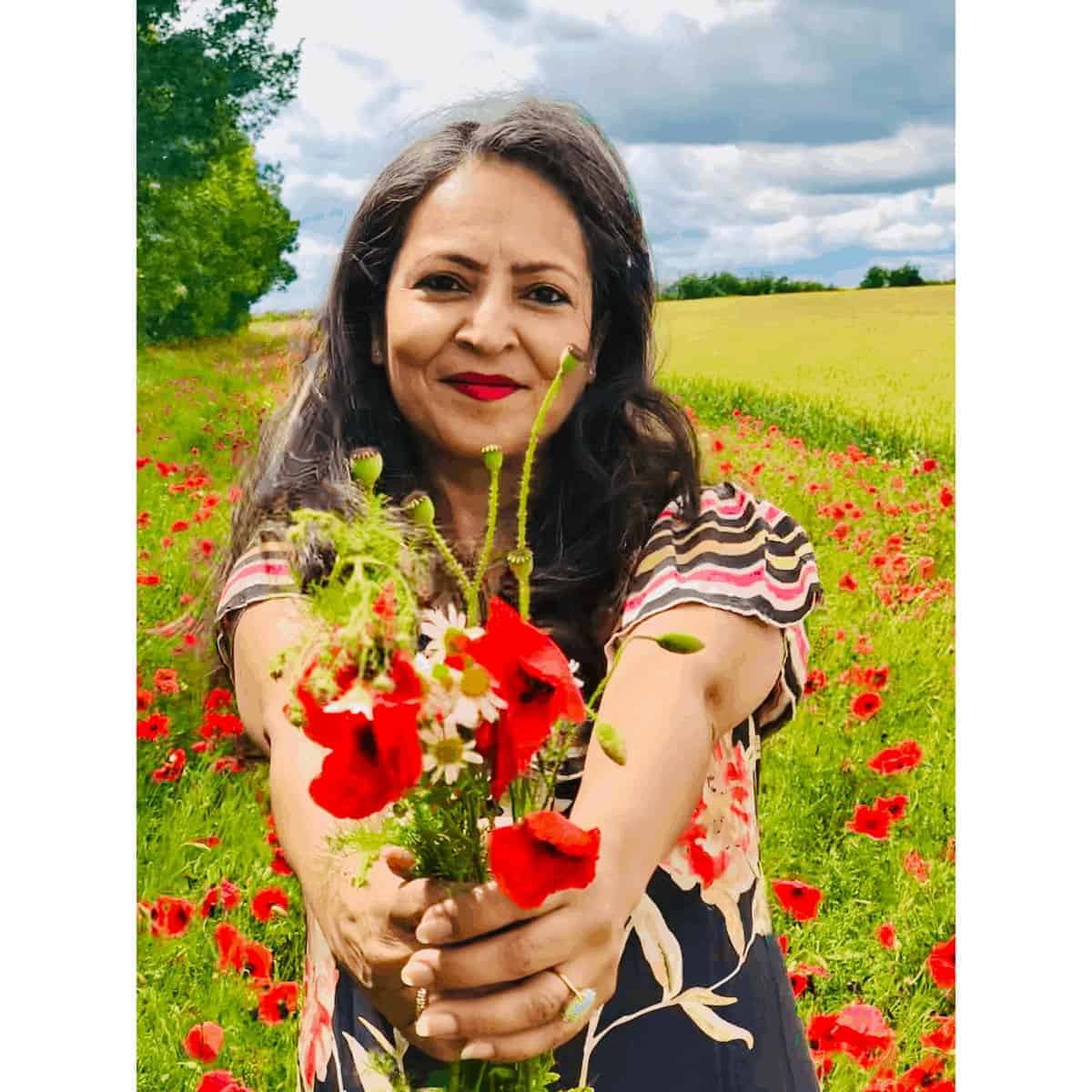 Blog author in a field of poppies