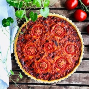 A whole savoury tomato and rose harissa tart