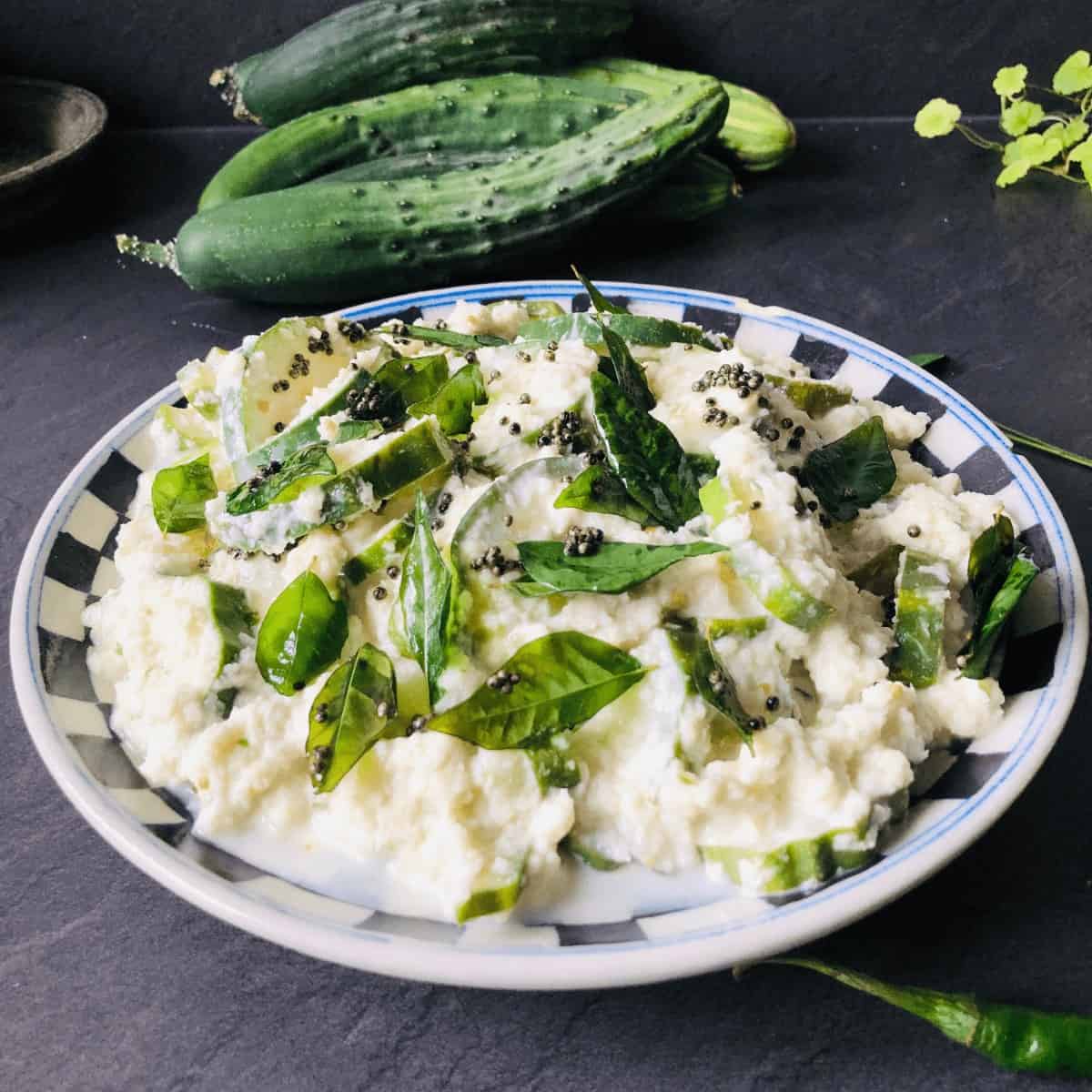 A plate of cucumber pachadi.