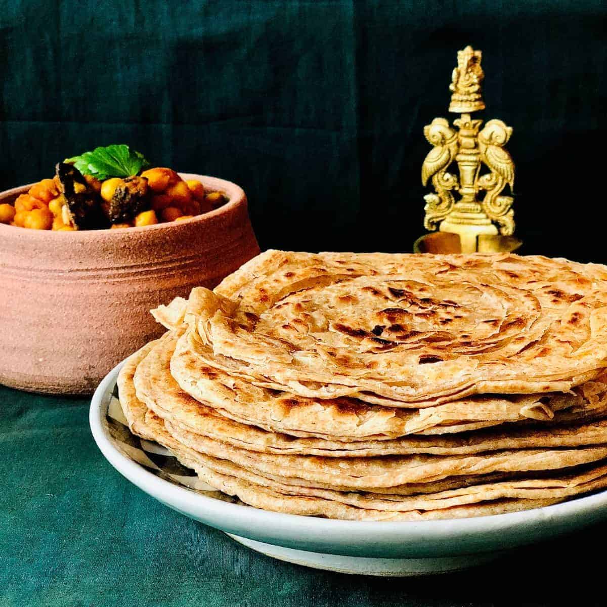 A pile of Laccha Paratha on a plate