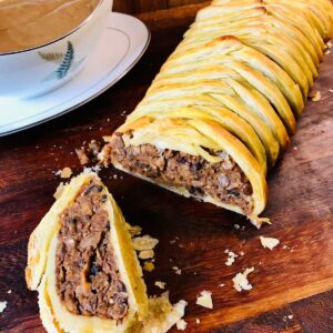 Vegan wellington with end cut revealing the filling