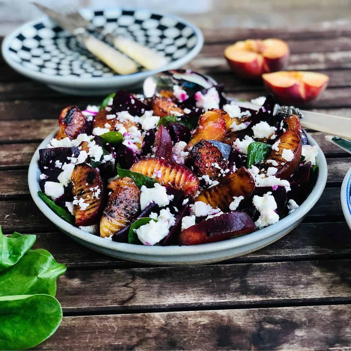 A Plate of beetroot, peach and feta salad