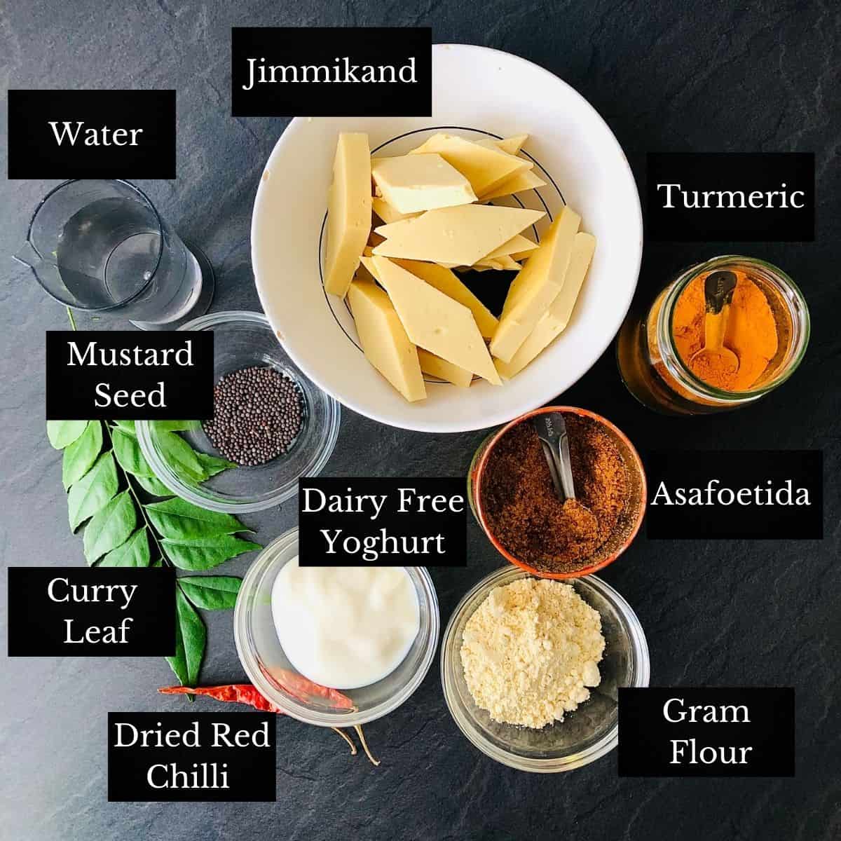 Ingredients for jimmikand in gravy in small dishes. Annotated