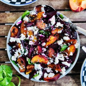 A plate of beetroot, peach and feta salad