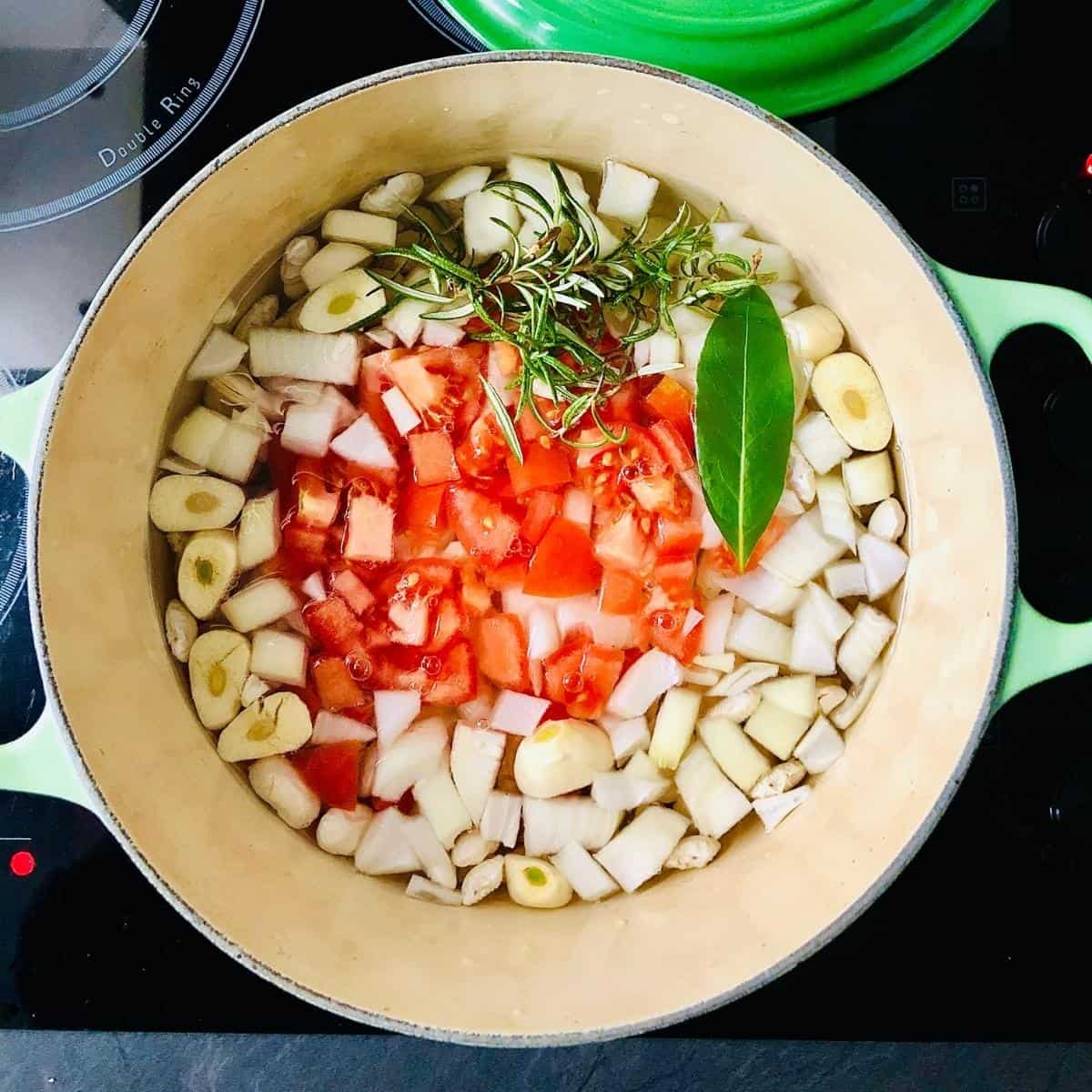 Butterbean stew ingredients in pot ready to cook