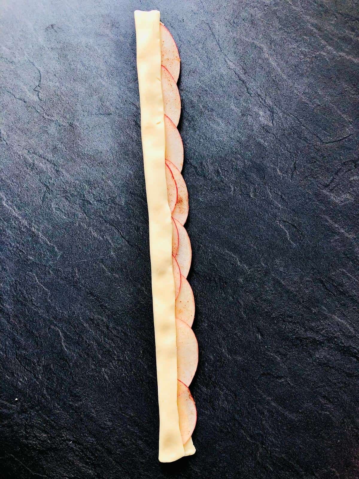 Pastry strip with apple petals