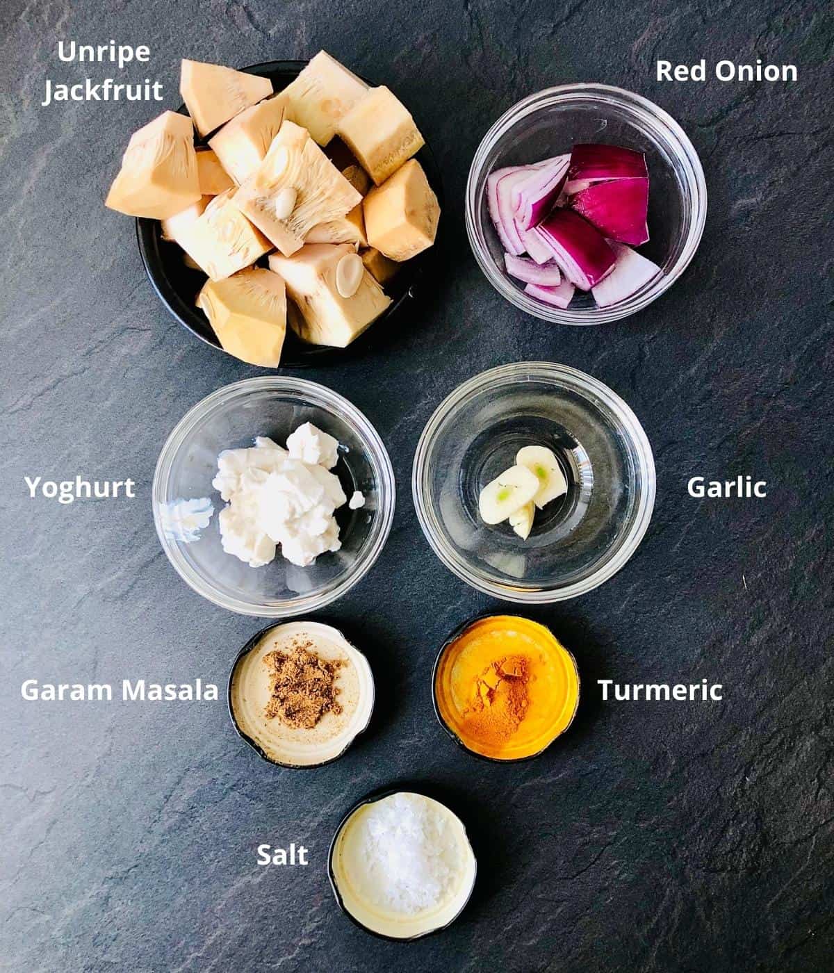 Ingredients for vegan jackfruit recipe marinade in shallow dishes. Annotated
