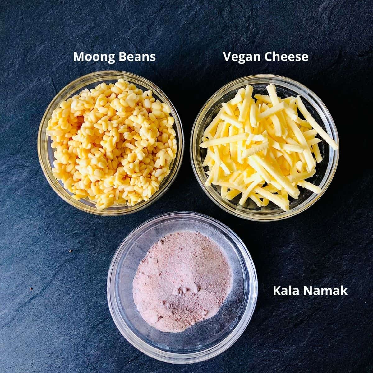 Ingredients for vegan omelette in small glass bowls.