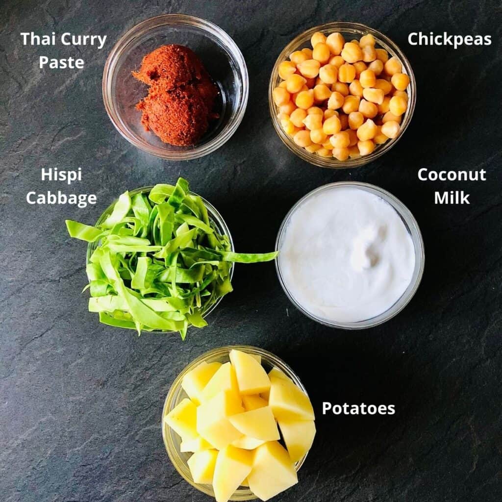 Ingredients for thai chickpea curry in small glass bowls. Annotated.