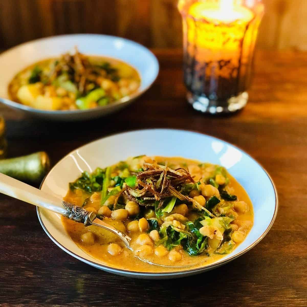 Two bowls of thai chickpea curry.