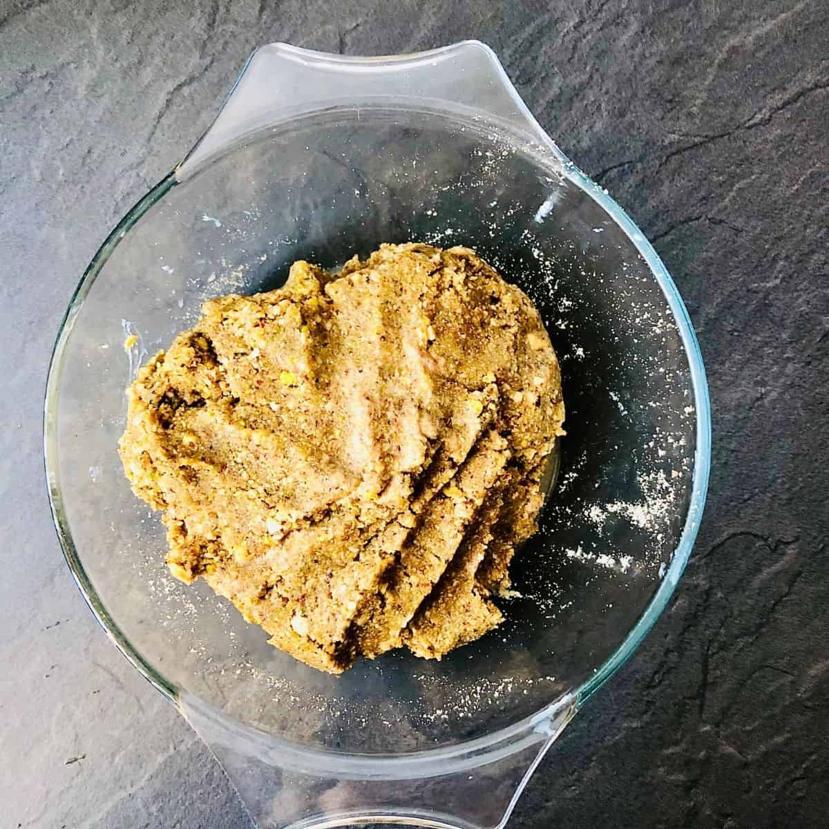 Thundai dry powder mixed together with Saltana paste in a glass dish