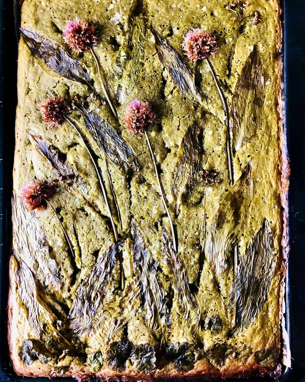 No-knead Wild garlic focaccia in a baking tray after baking