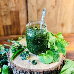 A jar of salsa verde made with foraged wild green.