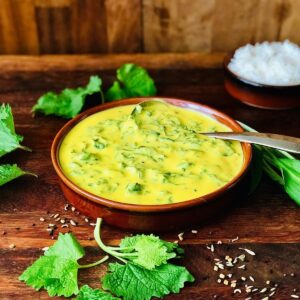 A shallow dish containing kadhi.