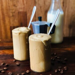 Two glasses containing cold coffee.