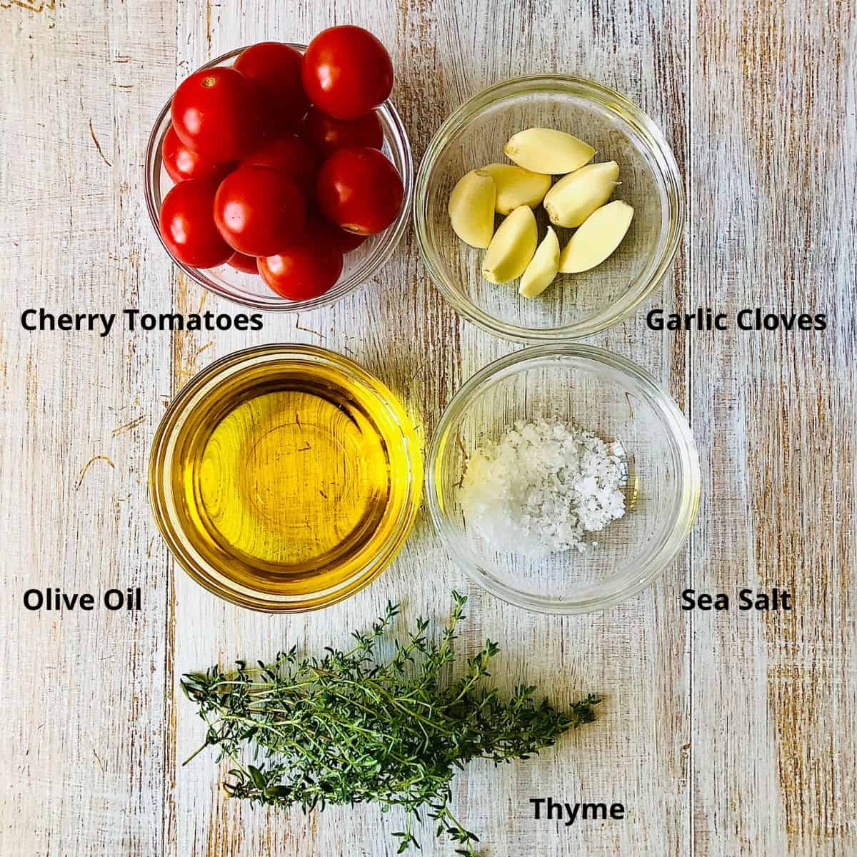 Ingredients for confit cherry tomatoes in small glass dishes. Annotated.