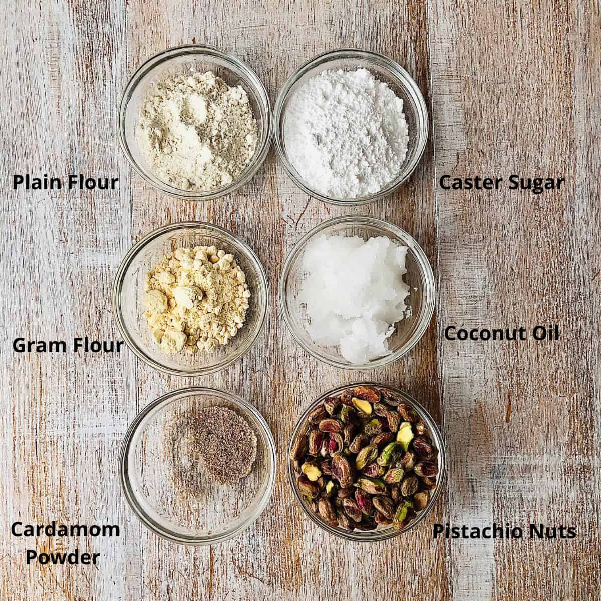 Prepared Ingredients for Nankhatai biscuits in small glass dishes.