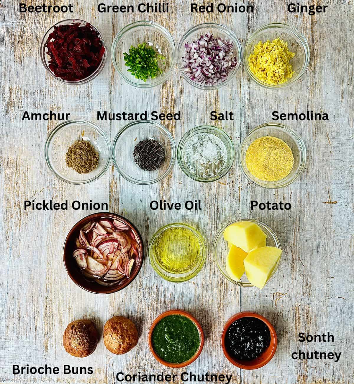 Prepared ingredients for beetroot burgers in small glass dishes. Annotated.