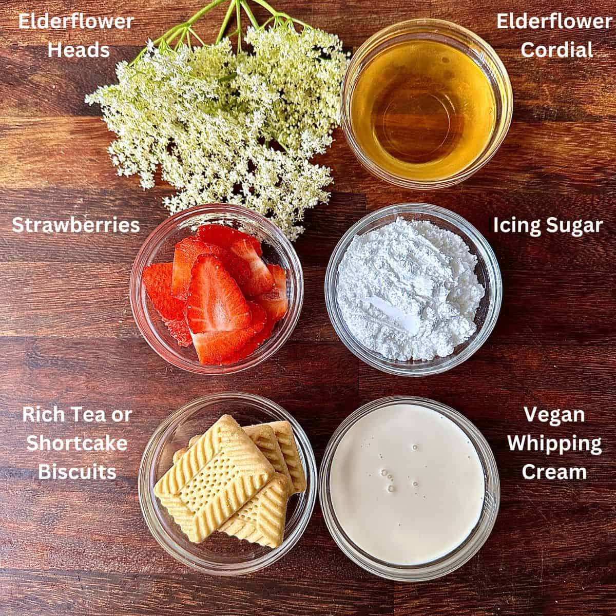 Ingredients for elderflower and strawberry cake in small glass dishes.