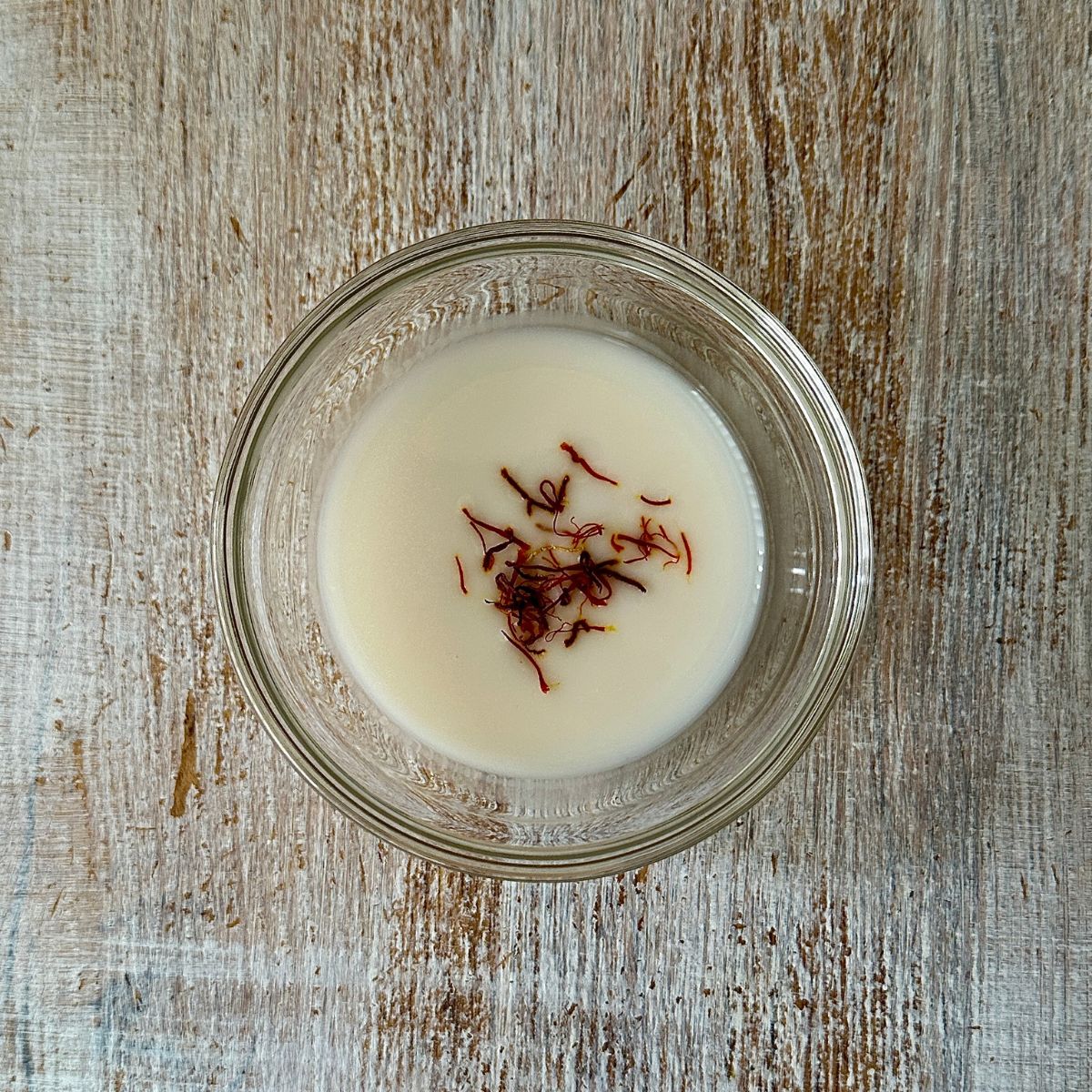 Small Glass dish containing milk and Saffron