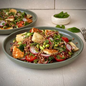 Couscous salad with zaatar halloumi, herbs, radishes and cherry tomatoes.