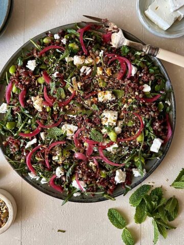 Camargue red rice, lentil and feta salad with edamame beans, fresh herbs and preserved lemon dressing.