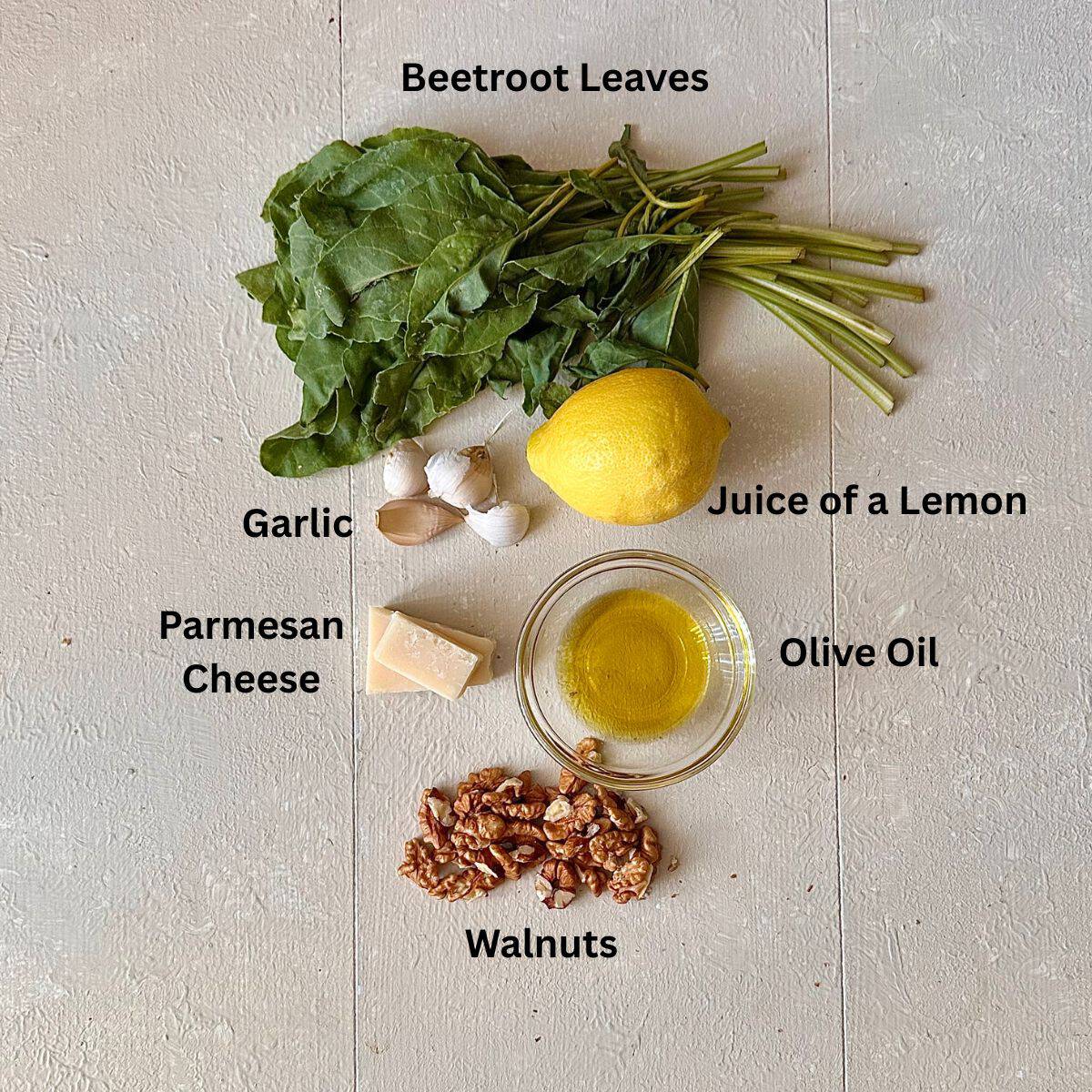 Beetroot tart pesto ingredients displayed against a white background. The ingredients are annotated.