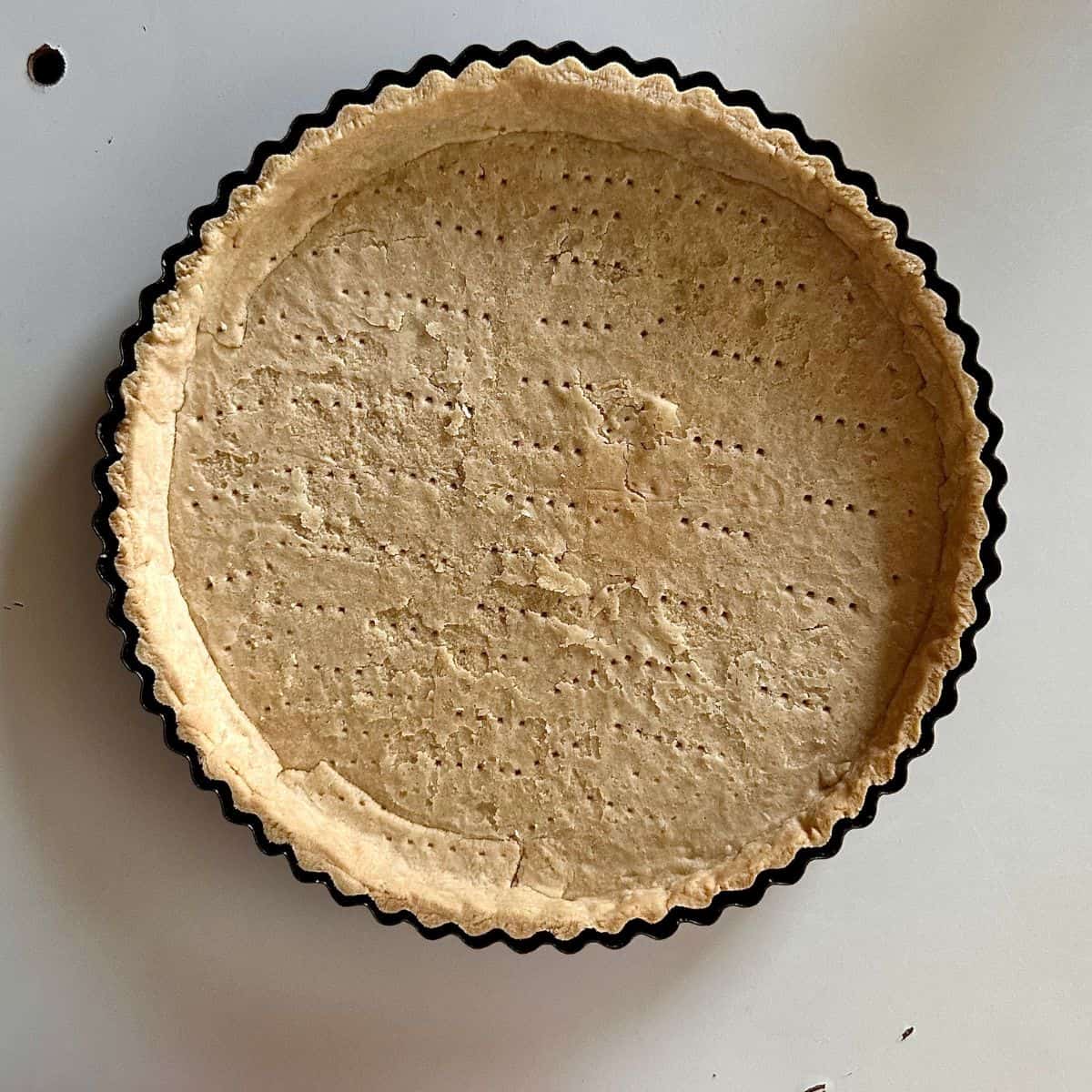 Cooked short crust pastry in a tart tin. For a beetroot and goats cheese tart.