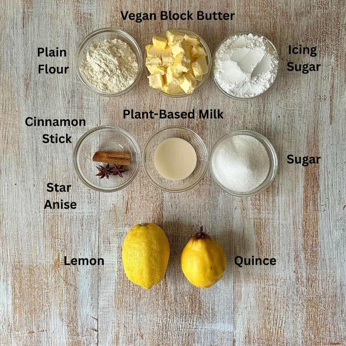 Vegan poached quince frangipane tart ingredients for the tart base, and a whole quince fruit. The ingredients are annotated.