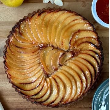 A glazed vegan quince frangipane tart.