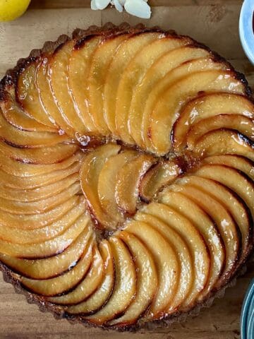 A glazed vegan quince frangipane tart.